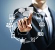 Businessman pressing virtual icons