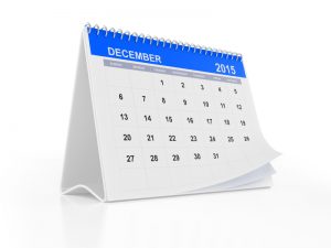 2015 December page of a desktop calendar on white background.
